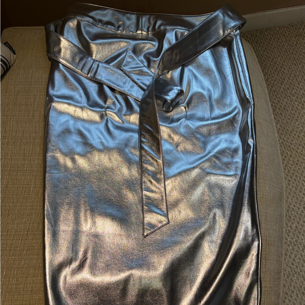 Never Fully Dressed 
Faux Leather silver wrap skirt